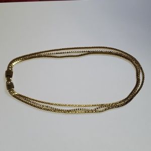 Gold Tone Three Strand Necklace with Rhinestones
